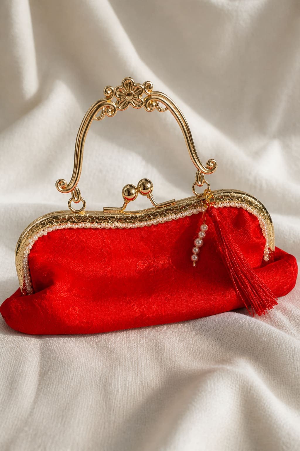 Akane Clutch — Vintage red kimono silk, hand-beaded gold frame