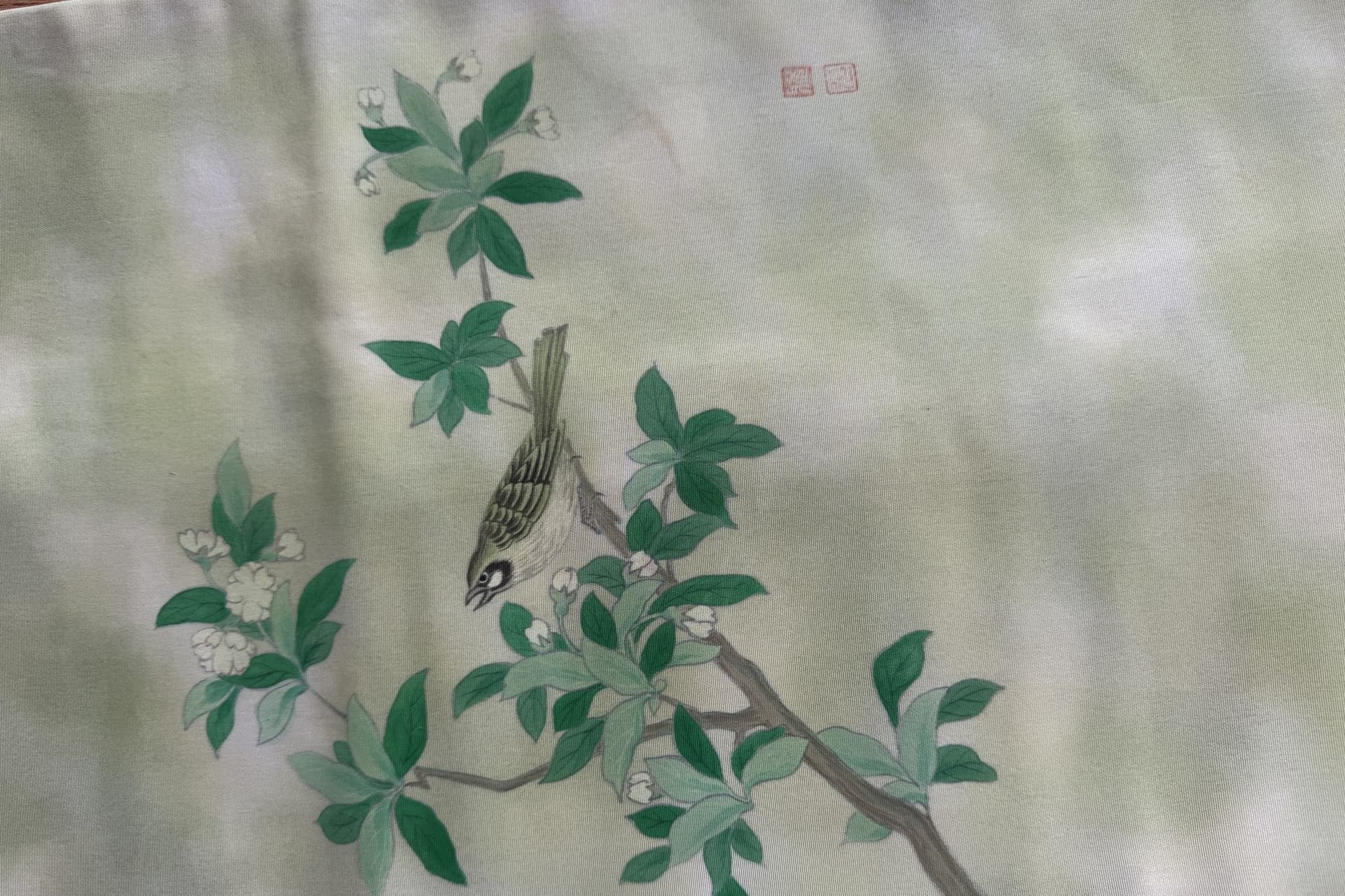 Vintage Kyoto obi silk with a painted bird on a flowering branch